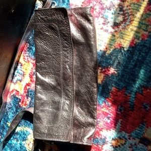 Latico purse with detachable over the shoulder strap, metallic silver leather